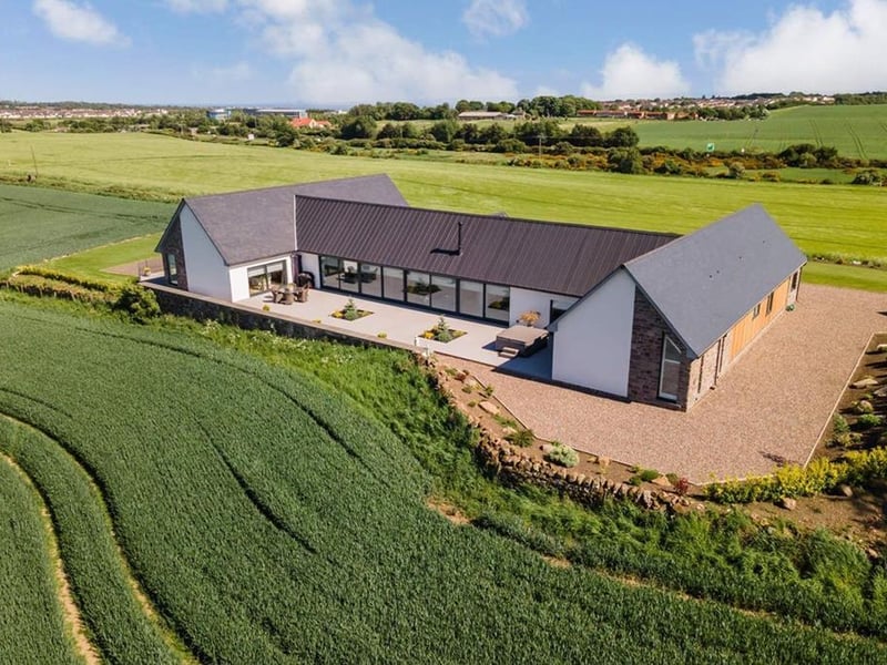 Rear view of property with Kirkcaldy in background.