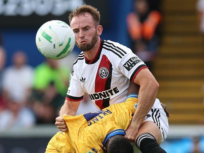 Wales international was touted to bolster Pompey's defensive options, but Chris Wilder wanted to keep him at Bramall Lane where the 27-year-old has remained inolved.