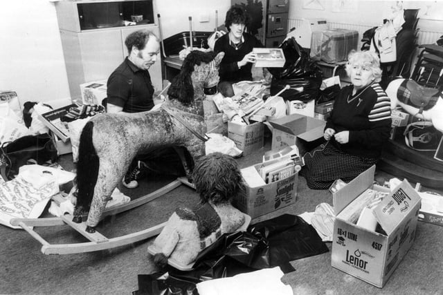 Christmas toy collection for miners children at the Sheffield Coordinating Centre against Unemployment, West Street. December 1984.