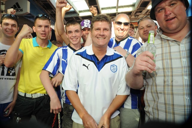 Owls fans have a beer with manager Brian Laws on the pre-season trip to Malta