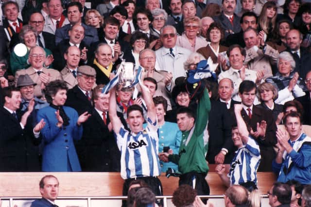 Nigel Pearson lifts the League Cup after Sheffield Wednesday beat Manchestre United in the 1991 final at Wembley
