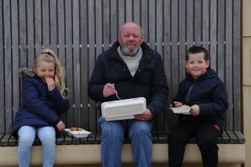 Norman Payne with grandchildren Isla and Harvey, enjoying their Good Friday fish and chips at South Shields seafront.
