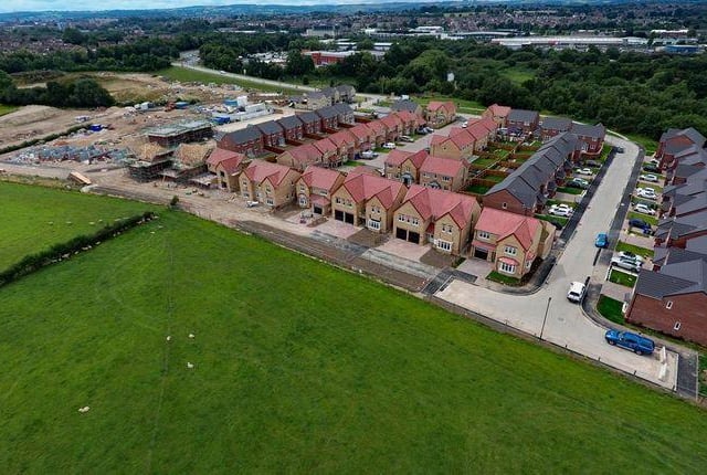 This five bedroom detached new build plot 110 on Rother Way is just over the train tracks from the lock and canal - it is on the market for £499,995. Marketed by Hunters, 01246 920989.