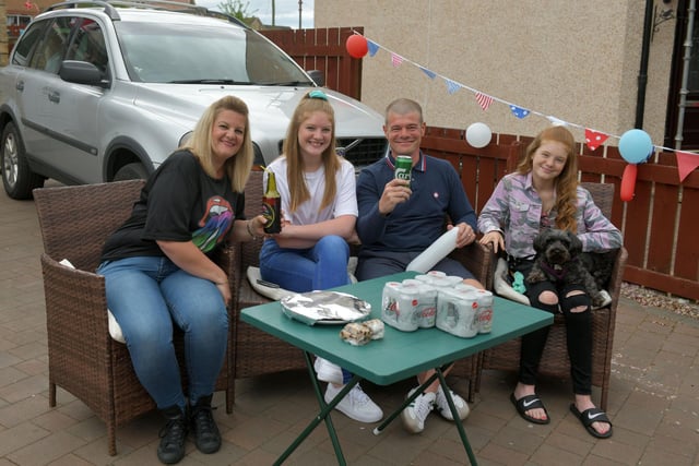 Several Carronshore residents headed outdoors to celebrate the 75th anniversary of VE Day. Pictures: Michael Gillen.