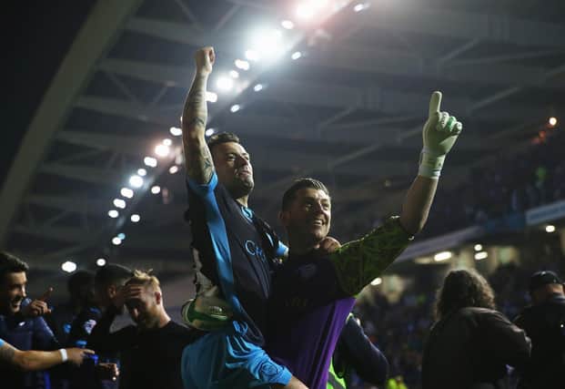 Sheffield Wednesday players Ross Wallace and Keiren Westwood celebrate after the Owls' 3-1 aggregate win over Brighton & Hove Albion in the 2016 Championship play-off semi-final, second leg clash at the Amex Stadium.  (Photo by Bryn Lennon/Getty Images)