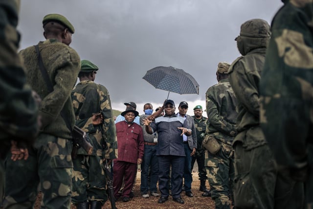 Congolese Defense Minister Aimé Ngoy Mukena addresses soldiers during an official visit to Bijombo