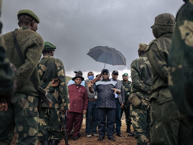 Congolese Defense Minister Aimé Ngoy Mukena addresses soldiers during an official visit to Bijombo
