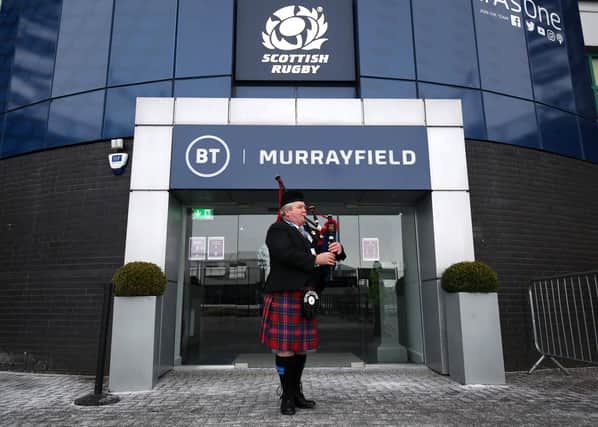 A piper outside the stadium welcomes the Scotland team prior to the Guinness Six Nations match at BT Murrayfield Stadium