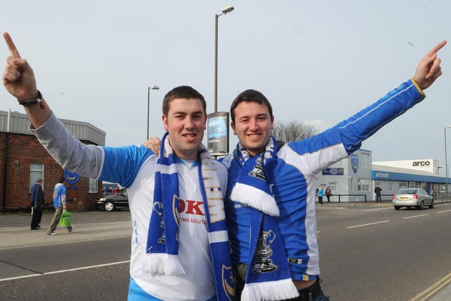 Brothers Andy and Chris Bleach get ready to board their buses for Wembley at Fratton Park.