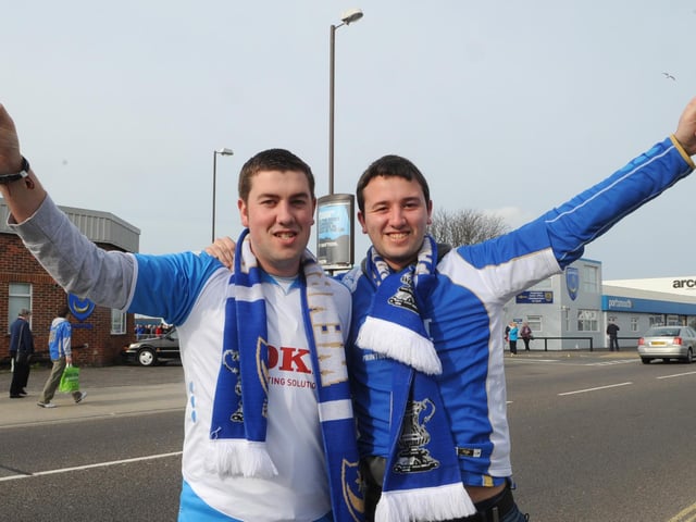 Brothers Andy and Chris Bleach get ready to board their buses for Wembley at Fratton Park.