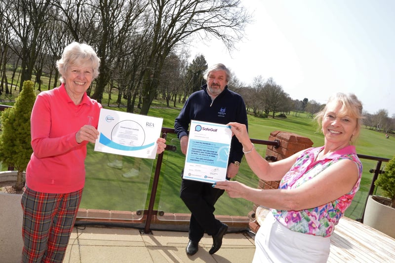 Geraldine Kaill (chairman of membership committee), Ian Hughes (club captain) and Kay Vickers (lady captain) are pictured with the Women in Golf Charter and Safe Golf awards the club has recently received.