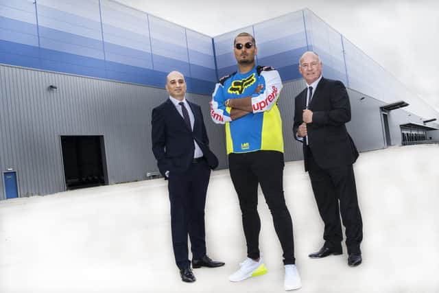 Umar Kamani of boohoo group launches the PrettyLittleThing warehouse in Sheffield in 2018, with Coun Mazher Iqbal, left, Clipper ownner Steve Parkin. 
Picture by Steve Parkin.