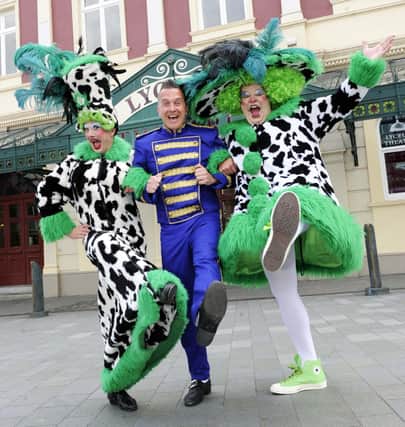 Members of the cast of Cinderella at the Lyceum Theatre:  Phil Gallagher with Ugly Sisters Matt Daines and Damian Williams