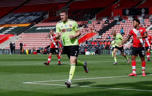 John Lundstram of Sheffield United celebrates after scoring his team's first goal during the Premier League match between Southampton FC and Sheffield United at St Mary's Stadium . (Photo by Andrew Boyers/Pool via Getty Images)