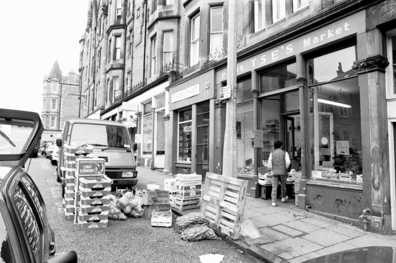 Fruit boxes and pallets outside the Chinese market  (Tse's fruit market) in Edinburgh's Argyle Place, October 1989. Other businesses were complaining the rubbish was affecting their trade.