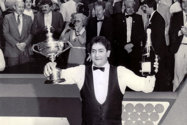 Joe Johnson lifts the trophy at the 1986 World Snooker Championship final at the Crucible Theatre