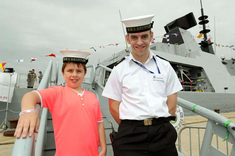 30th July 2010. Navy Days at the Portsmouth Naval Base. Pictured is Daniel Toom 10 of Gosport with LSC Graham Brown in front of HMS Dauntless 
Picture: Paul Jacobs  102427-12