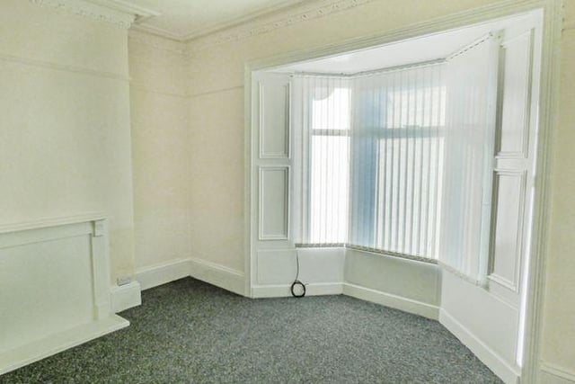 The master bedroom is recently decorated, carpeted and features a double glazed bay window with decorative features.