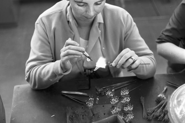 Woman making cathodes for sodium lamps at the Philips electrical factory at Hamilton in Lanarkshire, June 1966