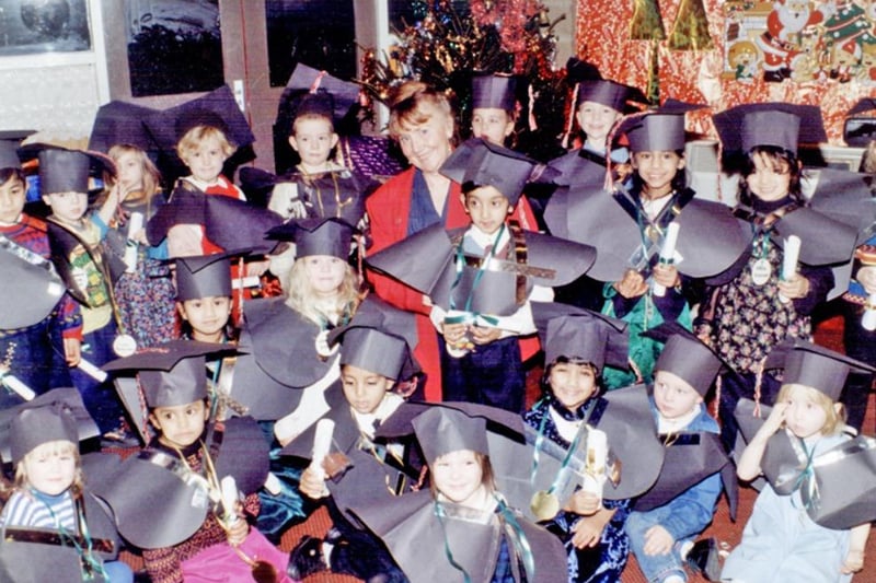 Children in graduation outfits at Tinsley School, on Siemens Close, Sheffield. The exact date of this photo is unknown
