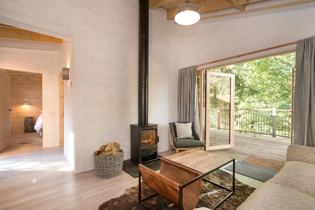 Despite opening as the seasons change and temperatures drop, each treehouse comes equipped with a wood-burning stove and cosy furnishings to keep out the cold. Don't forget that bath on the porch as well which you can enjoy outside.