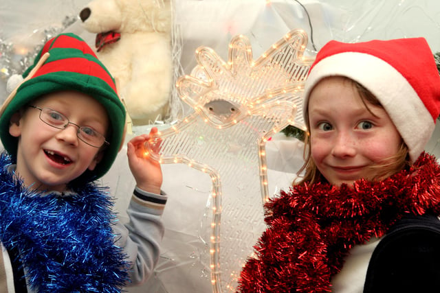 Tyler Smithurst and Emma Finnegan, pupils at  Speedwell Infant School, Staveley, at the school fair's Christmas grotto in 2007.