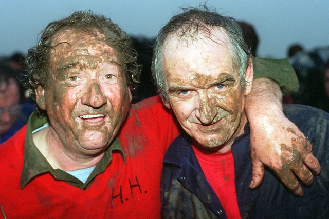 Pictured in 1999 were Boggin's (name for steward of the hood)Jack Keightley and lawrence Wall display the Haxey mud face pack.