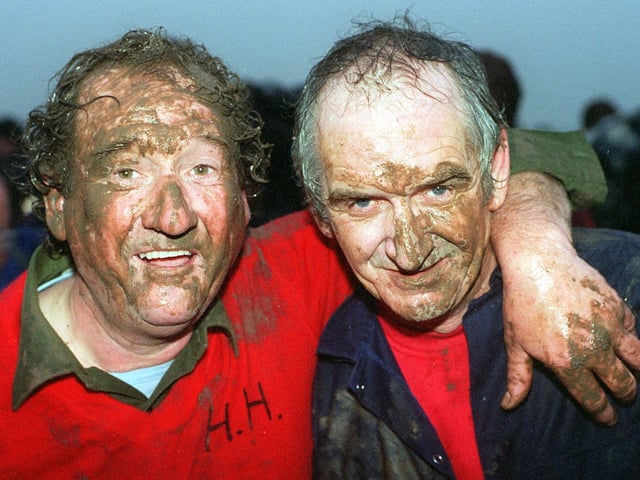 Pictured in 1999 were Boggin's (name for steward of the hood)Jack Keightley and lawrence Wall display the Haxey mud face pack.