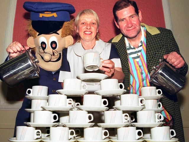 Helping to brew up funds for Menacp at Bentley Pavillion, Bentley, Doncaster, in 1998 were, from left, June Meanwell (Postman Pat), of Sprotbrough, Jackie Blackham (Alice in Wonderland), of Scawsby, and Ken Wilson (Mad Hatter), of Bentley, who organised the event.