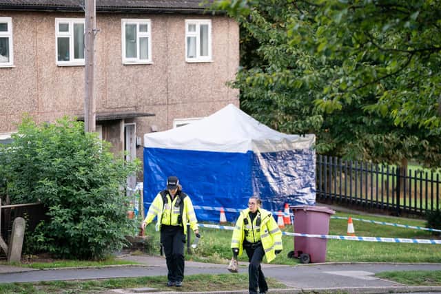 The scence in Chandos Crescent, Killamarsh, near Sheffield, where the bodies of John Paul Bennett, 13, Lacey Bennett, 11, their mother Terri Harris, 35, and Lacey's friend Connie Gent, 11, were discovered at a property. Damien Bendall was given a whole life order for their murders. PA WIRE/Danny Lawson