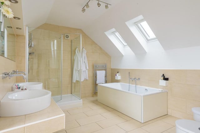 The master bathroom looks fantastic and has both a bath, shower, toilet and his and hers sinks. It can be accessed directly from the landing or from the master walk-in wardrobe.