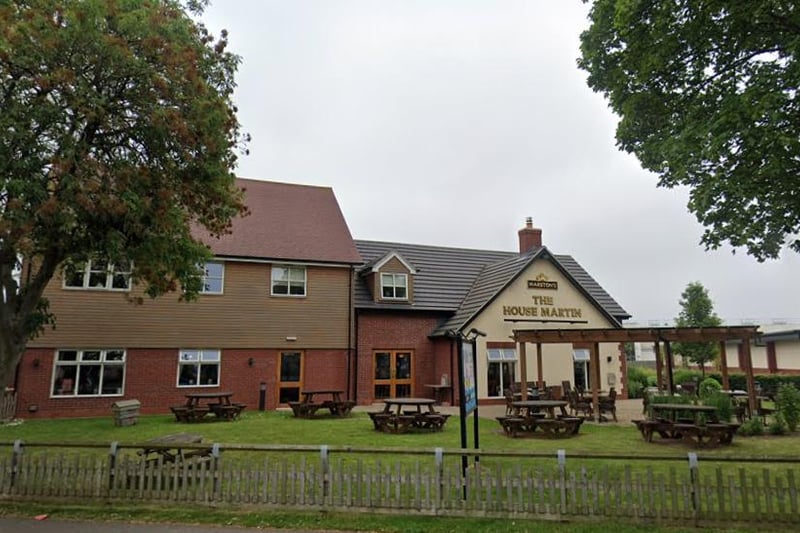 The pub has a large beer garden with a lawn area.