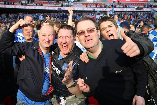 Pompey fans celebrate the success.