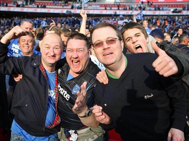 Pompey fans celebrate the success.