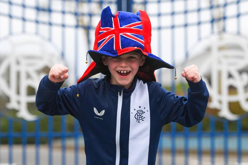 Alfie, aged 7, is pictured as Rangers fans gather outside Murray Park as they are crowned champions on March 07, 2021
