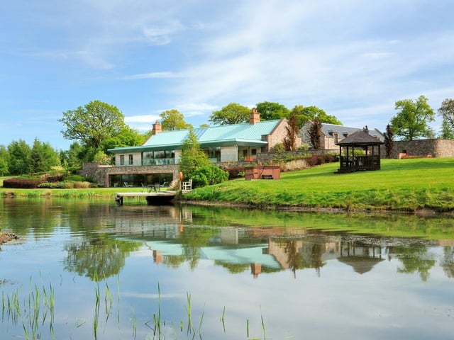 The property is located in Methven, in a private position in the Perthshire valley of the River Almond. The unique home sits surrounded by 172 acres of land, which includes several outbuildings and equestrian facilities.