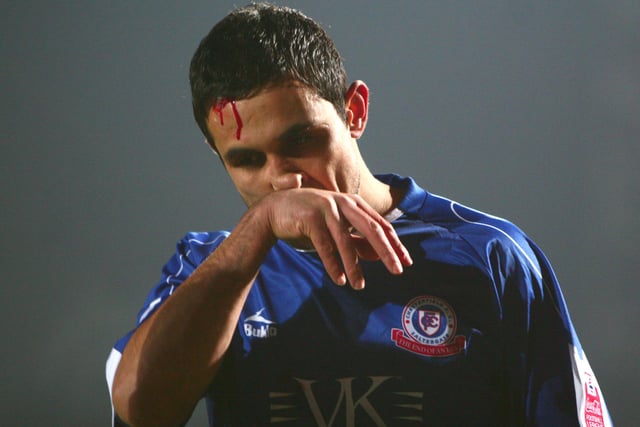 Blood pours from his head against Rotherham United in January 2010.