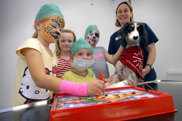 A Vets 4 Pets open day in 2009 and look at these children having a lovely time with pet dog Sassy.