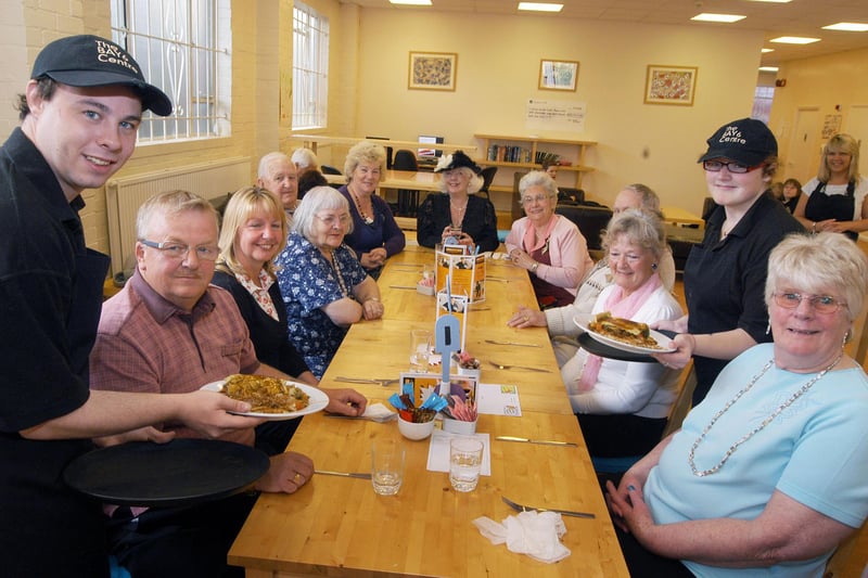 West Notts College practical work skills students, Darren Waite and Emma Marshall, serve up a special VE dinner to members of Age UK group Kindred Spirits at the Bay 6 café in Mansfield in 2011.