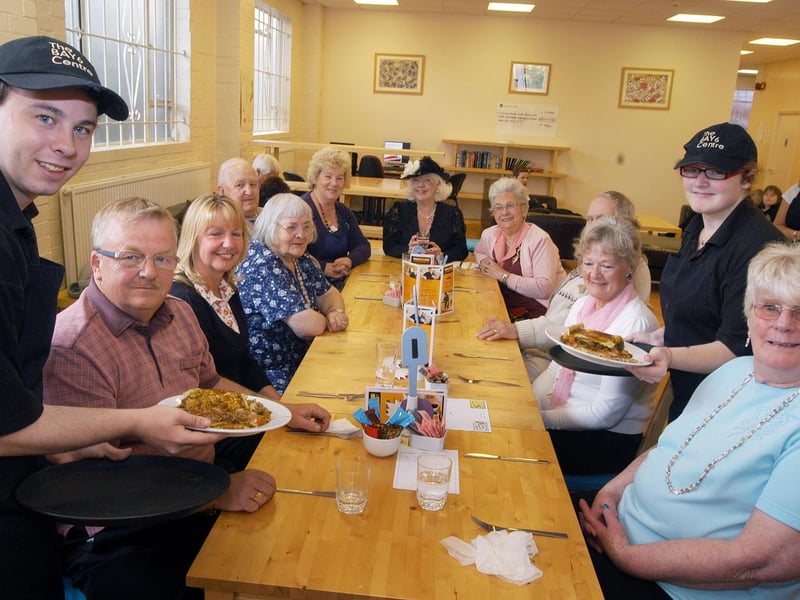 West Notts College practical work skills students, Darren Waite and Emma Marshall, serve up a special VE dinner to members of Age UK group Kindred Spirits at the Bay 6 café in Mansfield in 2011.