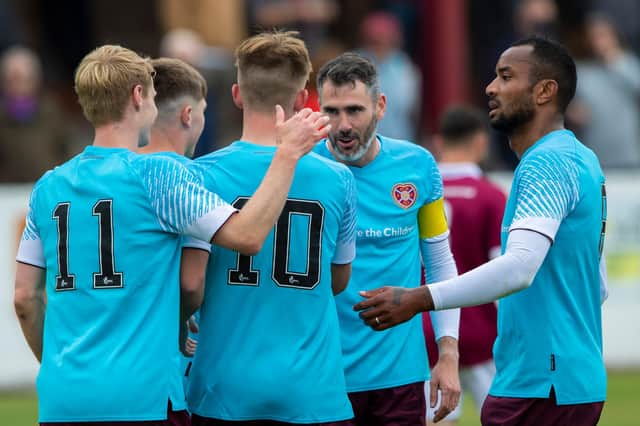 Hearts players' including Loic Damour (right) celebrate Finlay Pollock's opener in the friendly win over Linlithgow Rose at Prestonfield (Photo by Craig Brown / SNS Group)