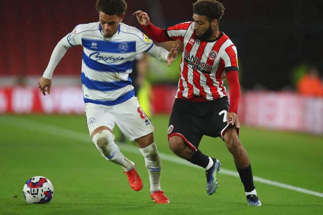 Luke Amos of QPR and Jayden Bogle of Sheffield United during the match at Bramall Lane: Lexy Ilsley / Sportimage