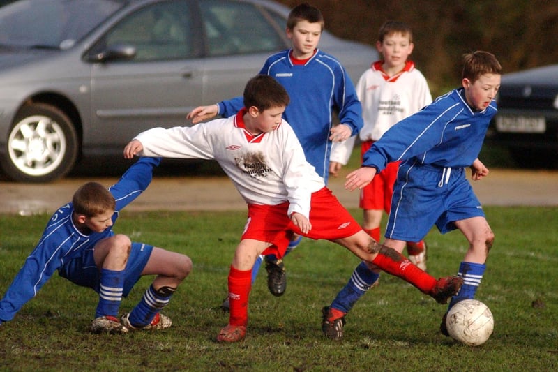 A 2004 under-12 football match between Monkton Footy Azzum in blue and Chuter Ede Eagles. Who do you recognise?
