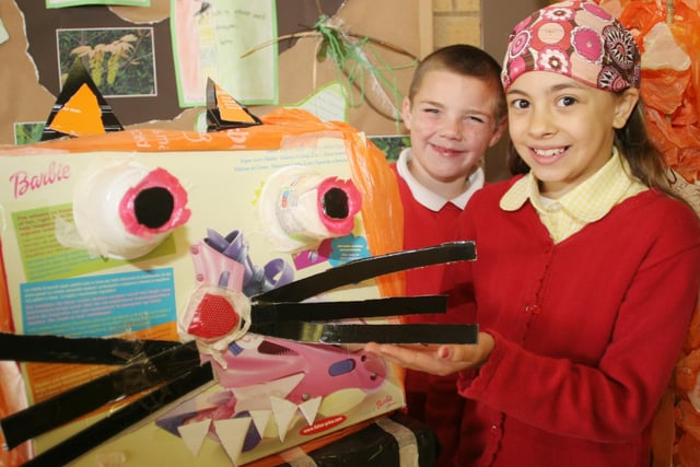 Reignhead primary pupils Thomas Barrett and Miriam Omar with their re-cycled tiger.