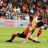 Morgan Gibbs-White of Sheffield Utd skips past Richard Smallwood of Hull City during the Sky Bet Championship match at the MKM Stadium, Kingston upon Hull. Picture credit should read: Simon Bellis / Sportimage
