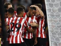Sheffield United defender Max Lowe is congratulated by his team mates