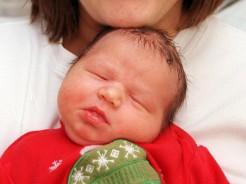 Tracy Riggot with her son James George. Christmas Day baby in 1999.