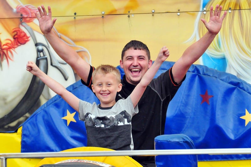 Layton Whitelock (8) with his cousin Lee Murphy enjoying a ride on the bulls at the carnival.