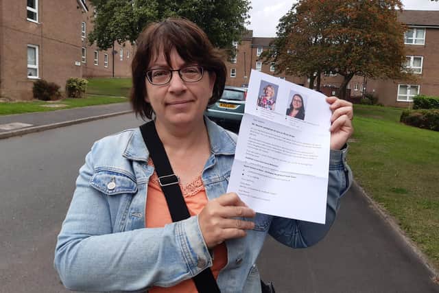 Coun Ruth Milsom with one of the leaflets distributed on Brick Street