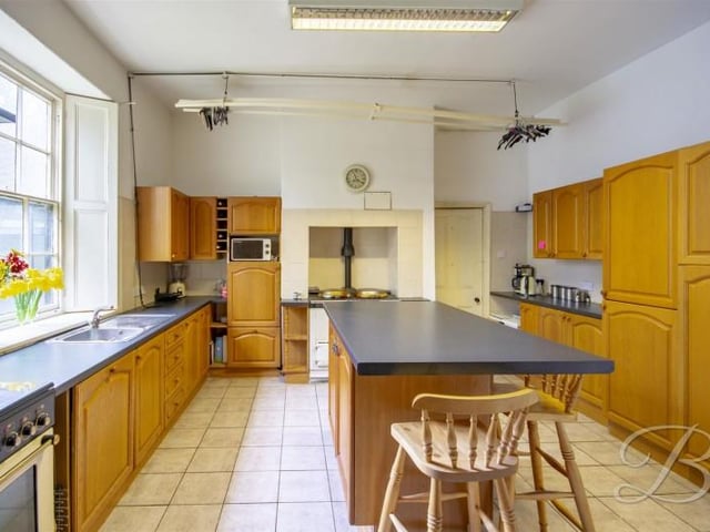 Along with this kitchen there is also a breakfast kitchen, utility room and two store rooms.